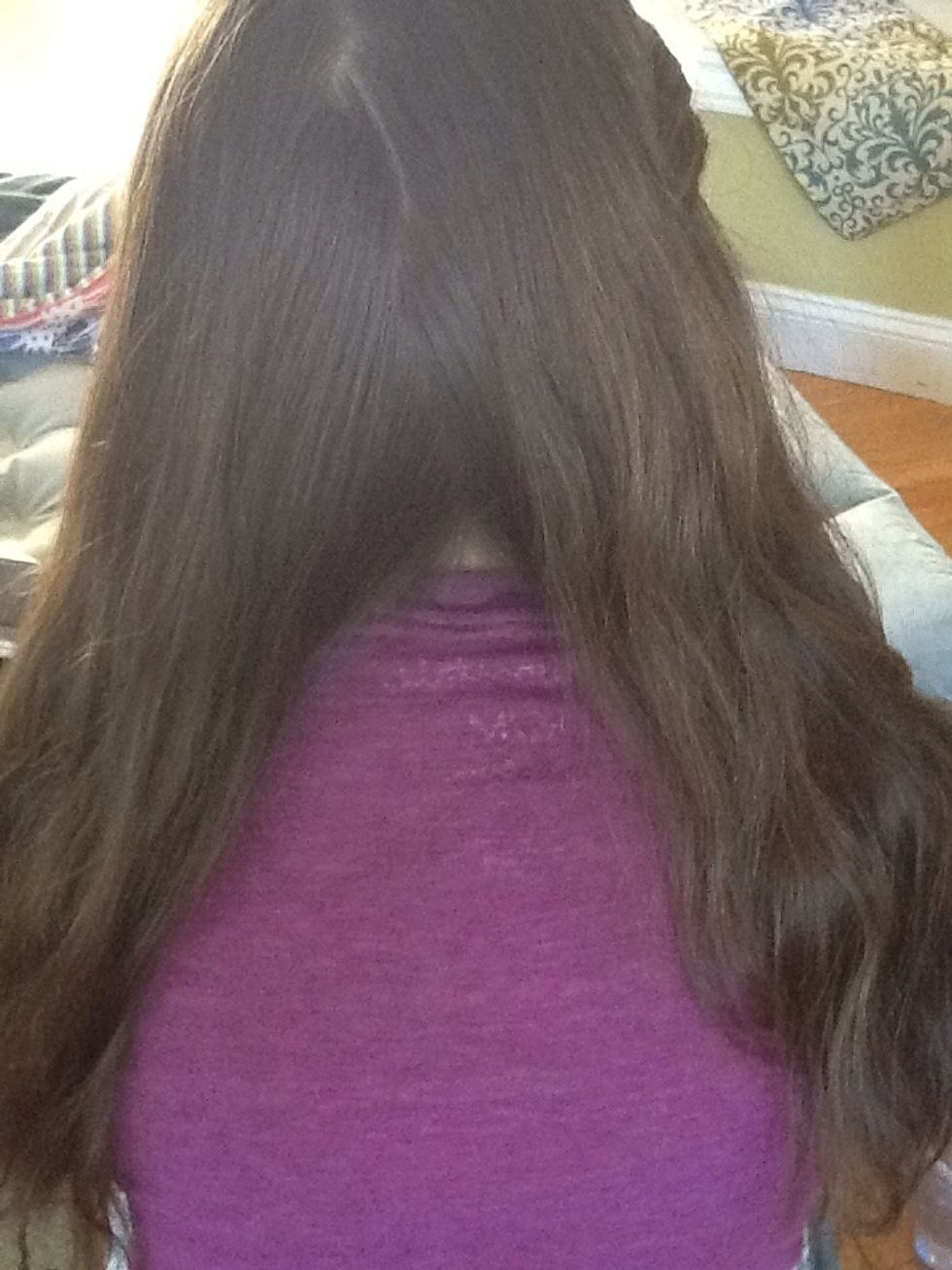 Now separate your hair into two sections like so.