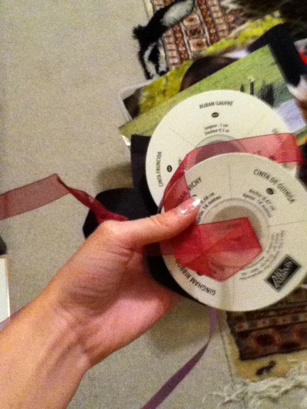 Now sew on the ribbons or fabric scraps onto the sock anywhere you like