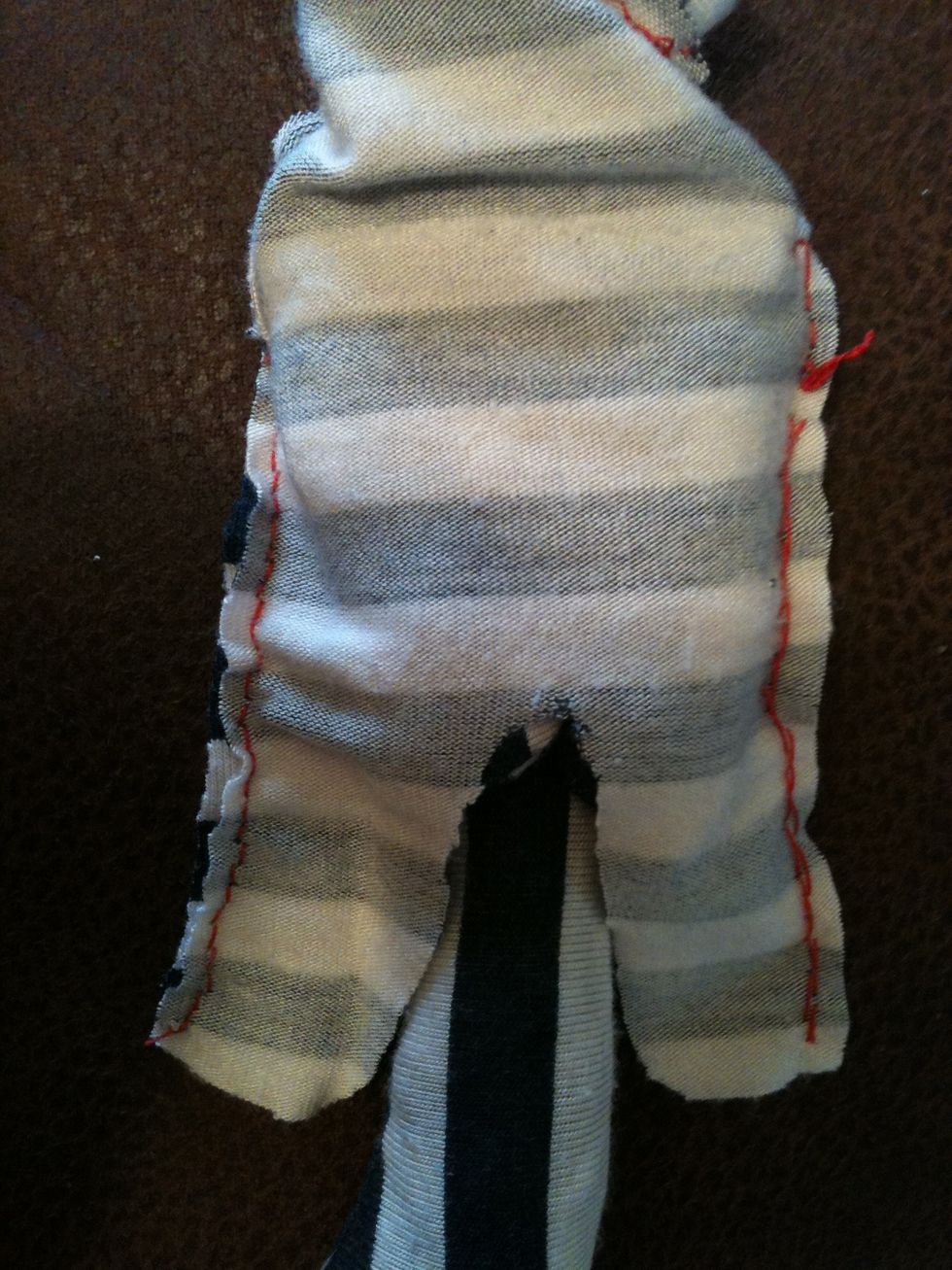 Now sew where I have down each side, leave the bottom of the foot and the inside leg! Now you can turn the whole thing right side in.