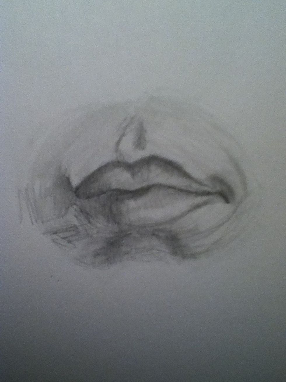 Now shade the lips. To create the illusion of them being 3D I make a shading line that looks like a sideways "T" from the middle of the mouth to the bottom of the lower lip.