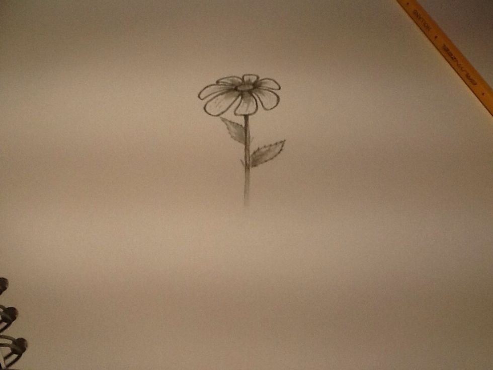 Now, sharpen your pencil (or use a fine tip pen, if you think that looks better) and draw lots of tiny circles to fill in the bud of the flower with the seed things it contains
