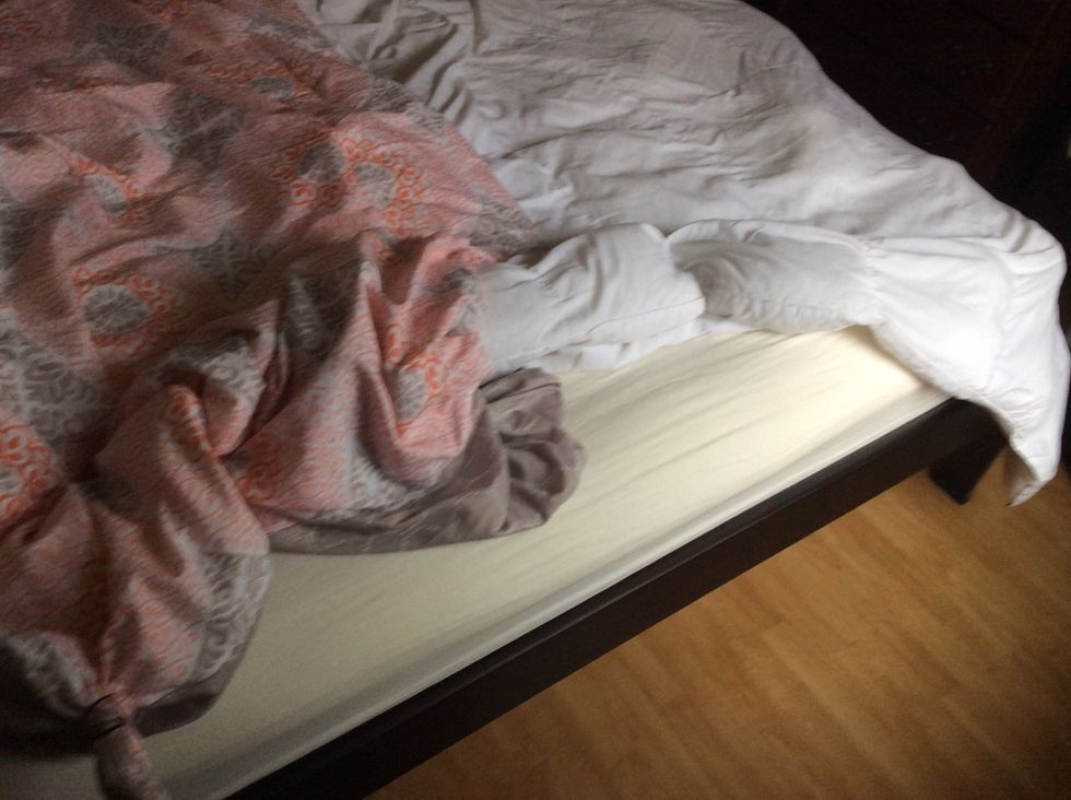 Now shimmy the duvet over the rest of the blanket to the end