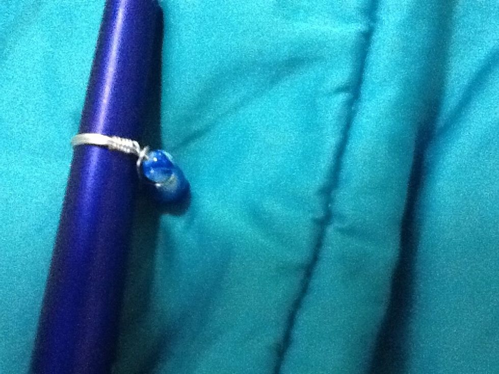 Now side the ring back on the ring mandrel and it should be 1-2 sizes smaller depending on how many coils you made.