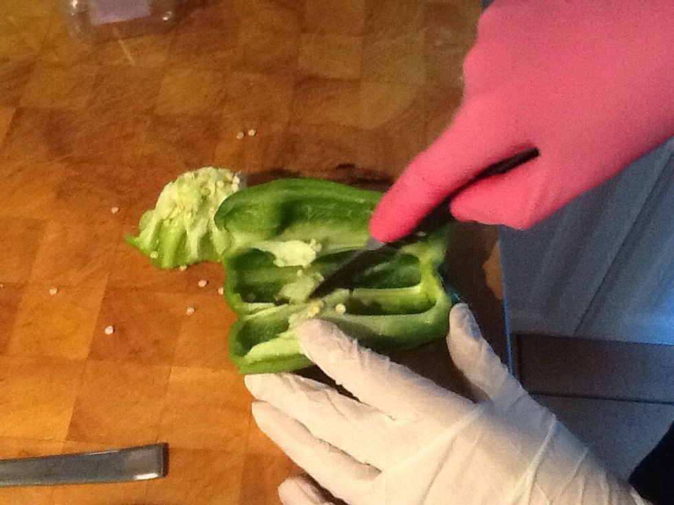 Now slice the capsicum where you see the creases.