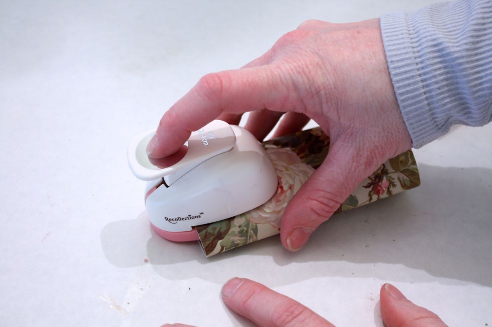 Now slip the punch in there and punch out both sides- empty the chads out as you go, you will need them later