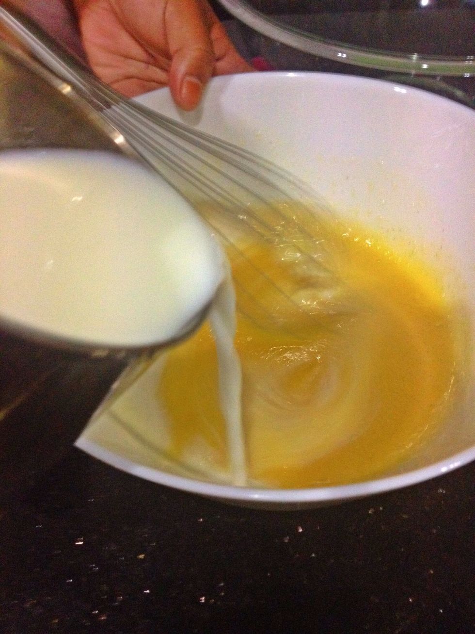 Now slowly add your milk and cream to the bowl. I whisked while adding but it isn't necessary. I actually did it because my milk was warm and so I didn't want to 'cook' the eggs.