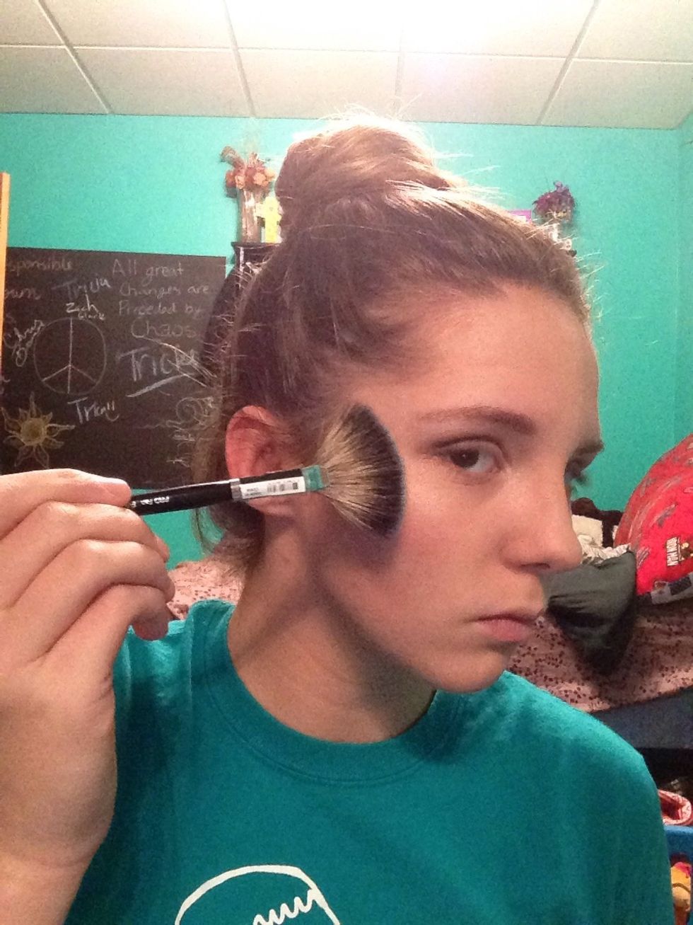 Now some more highlighter! Take your fan brush and dip in your powdered highlighter. Spread in the same place as the liquid highlighter!