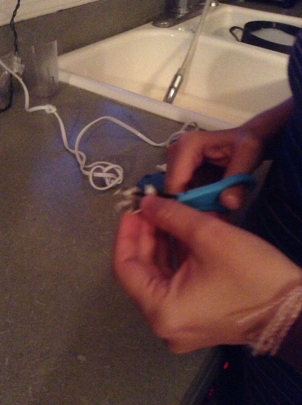 Now sorry about the blurry picture but cut a little circle out of one of those things that you put at the bottom of a chair leg to keep it from scratching the floor but cut off the fuzzy part before.