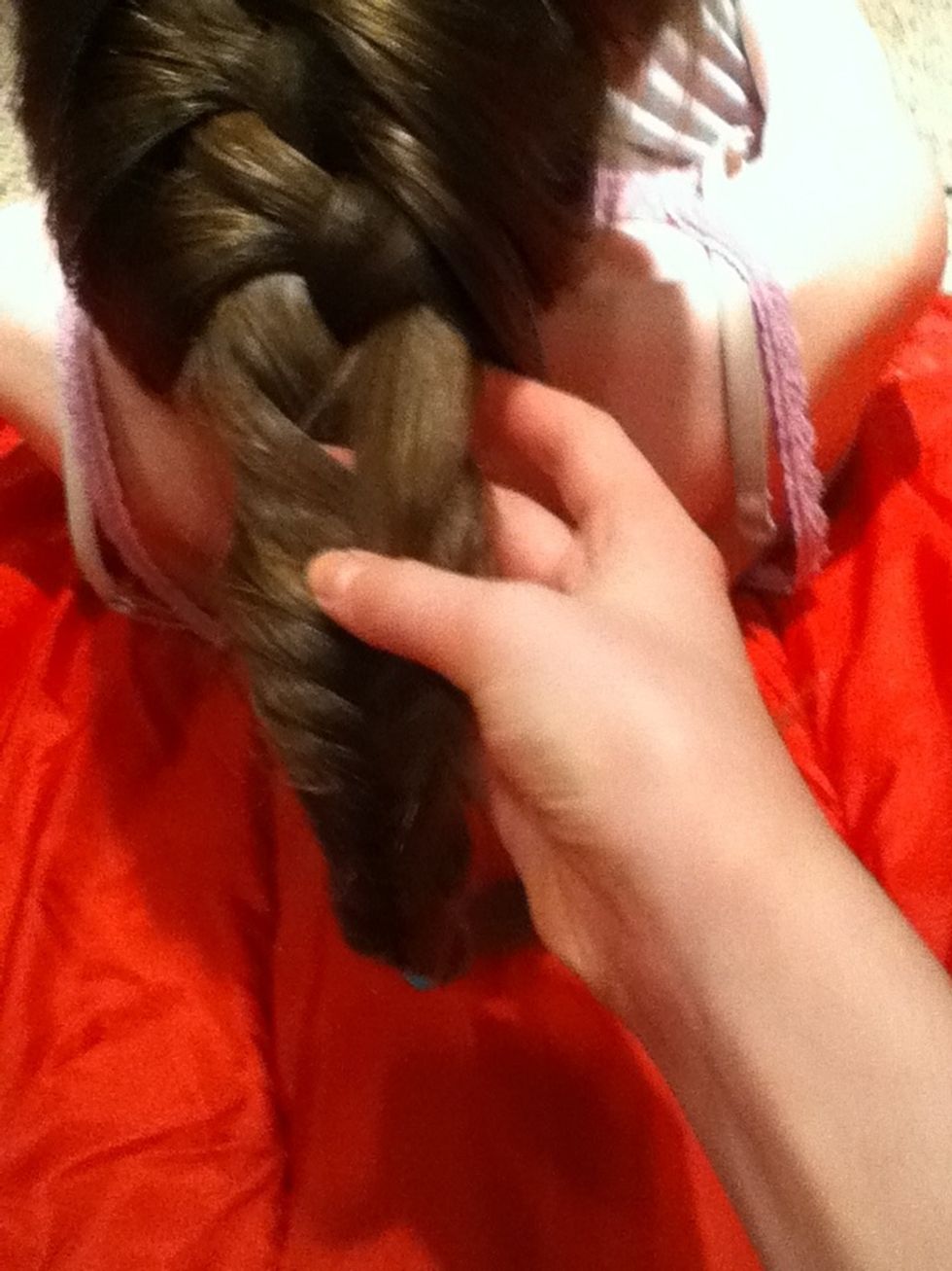 Now speed out the braid so that it blends in with the fishtail