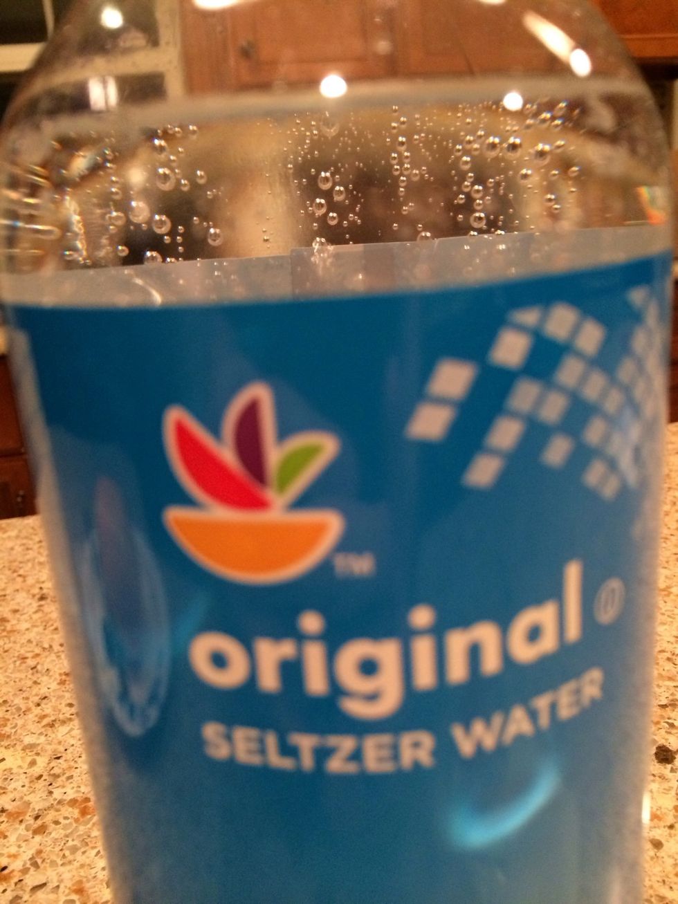 Now, splash in some seltzer water (club soda works too). If you need an exact measurement, add 1-2 teaspoons.
