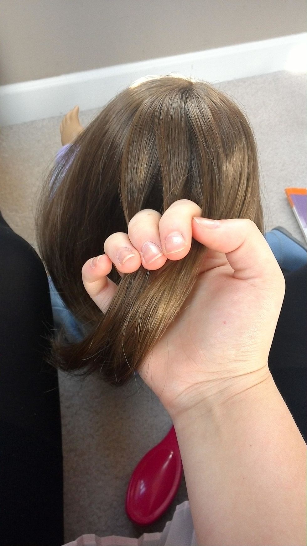 Now split that small section into three smaller sections to begin the braid.