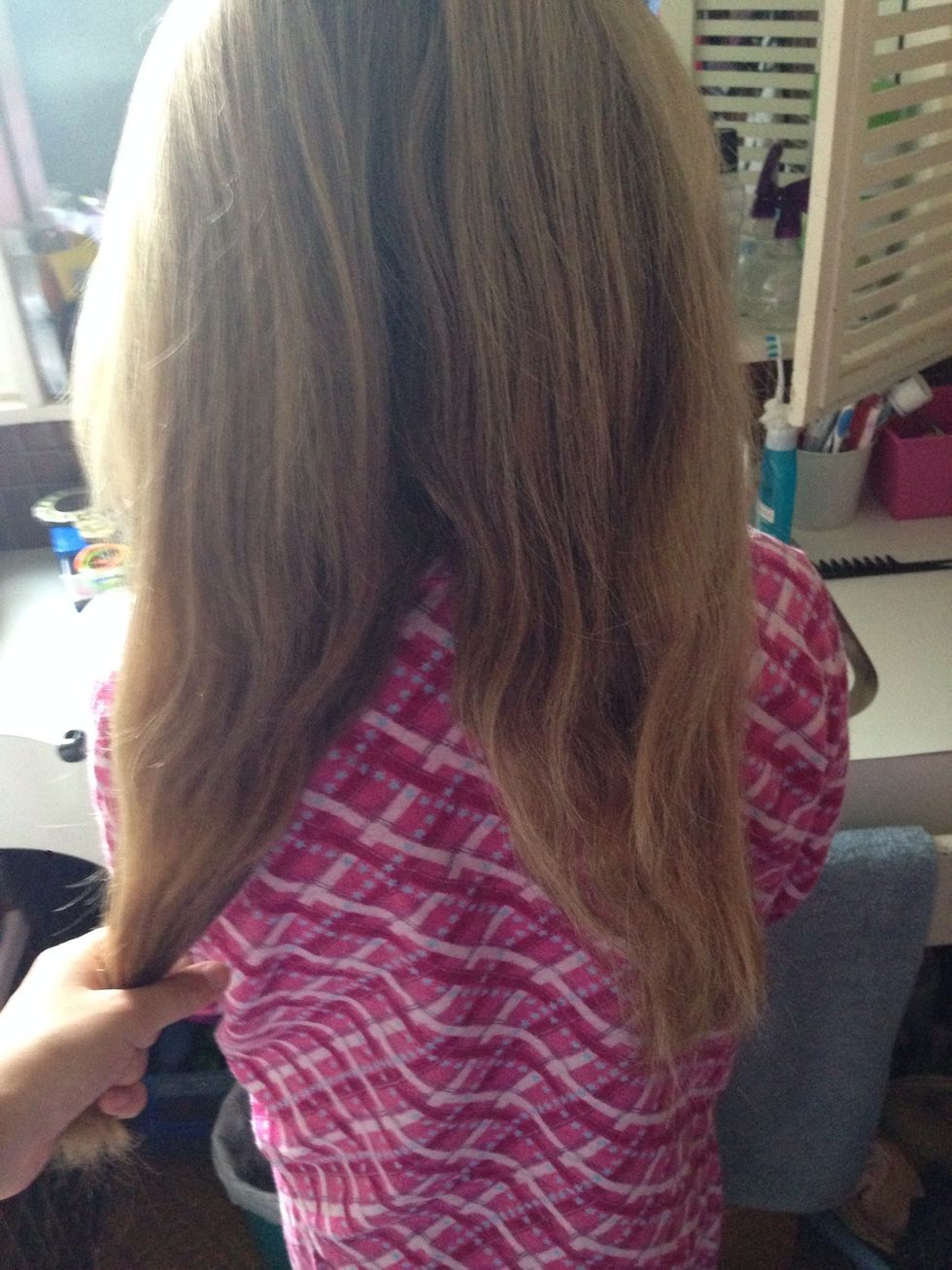 Now split you're hair in two sections.