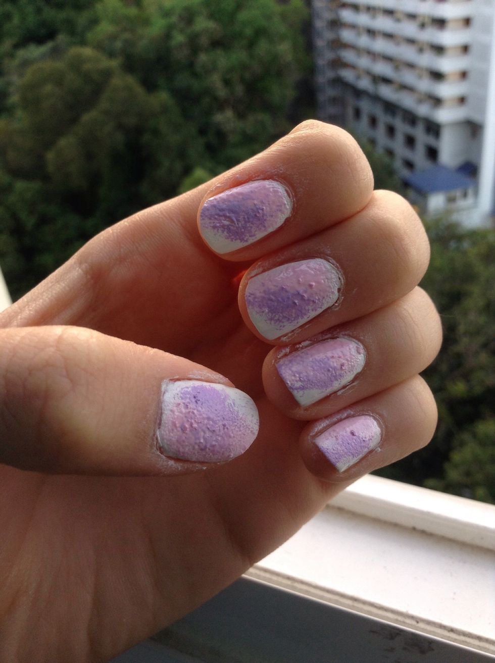 Now sponge on some purple beside the pink, leave a small corner on the top white