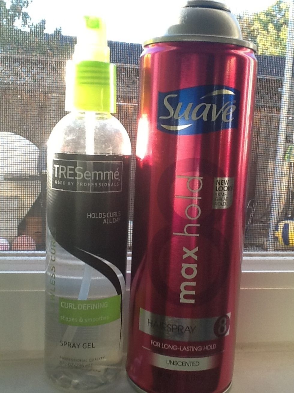 now spray a light layer of hairspray over your waves. I use Suave Max Hold. now take curl defining gel and spray your ponytail with a coating of it. I use TRESemm\u00e9 curl defining spray gel.