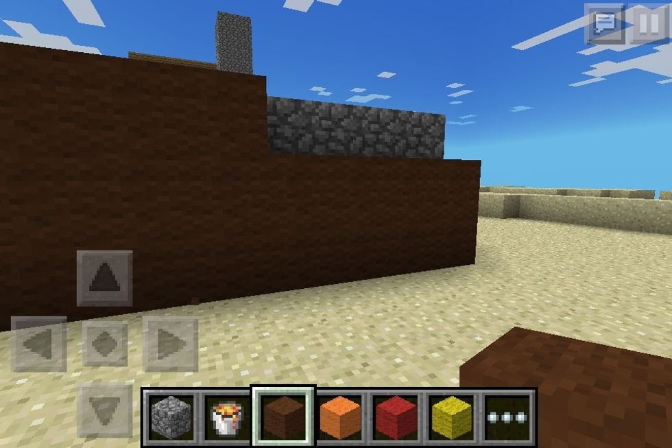 Now start building a layer on the outside made out of brown wool