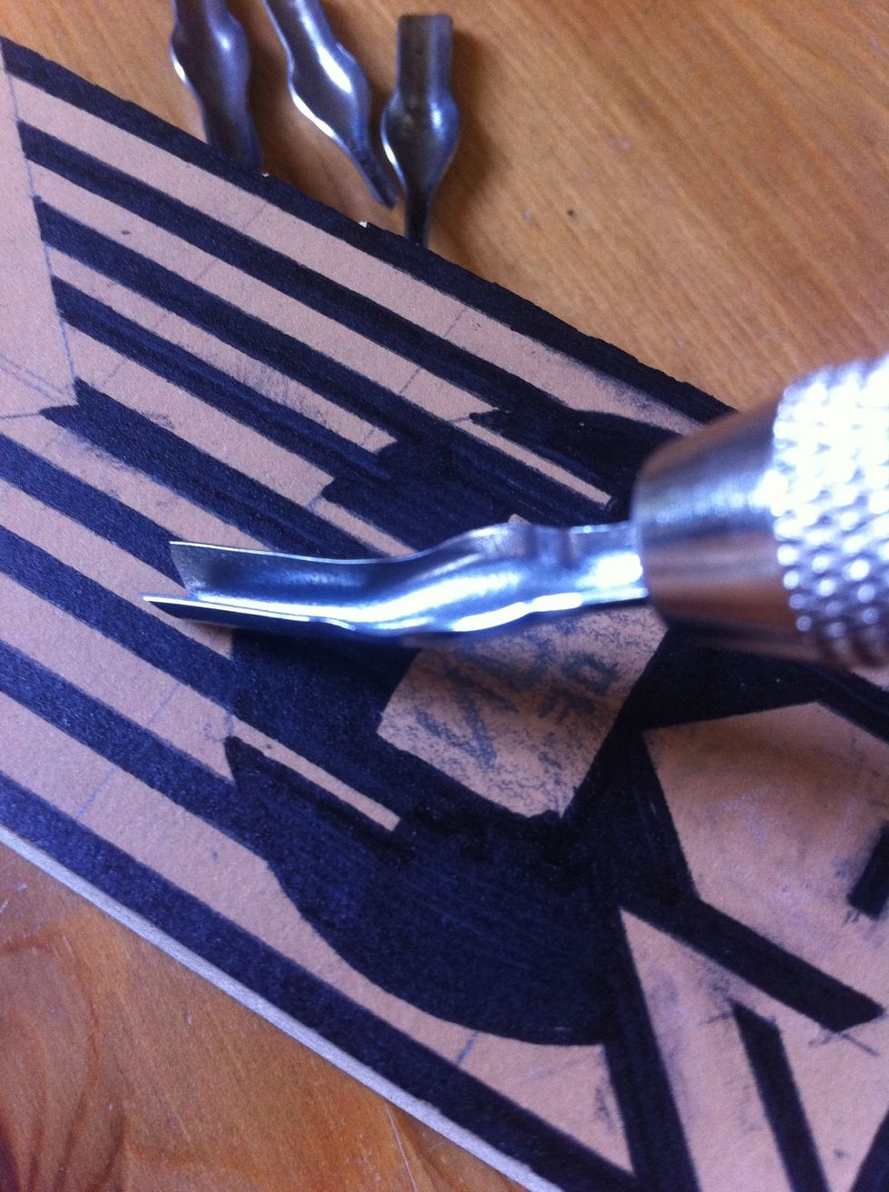 now start carving. start with straight away lines so you can get used to how hard you need to push it into the flesh.