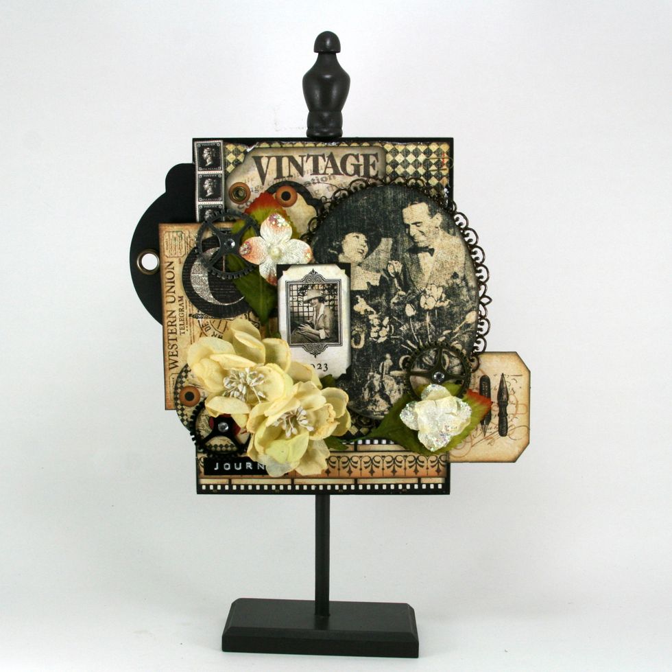 Now start filling in the arrangement with smaller Petaloo flowers with a little sparkle on them.