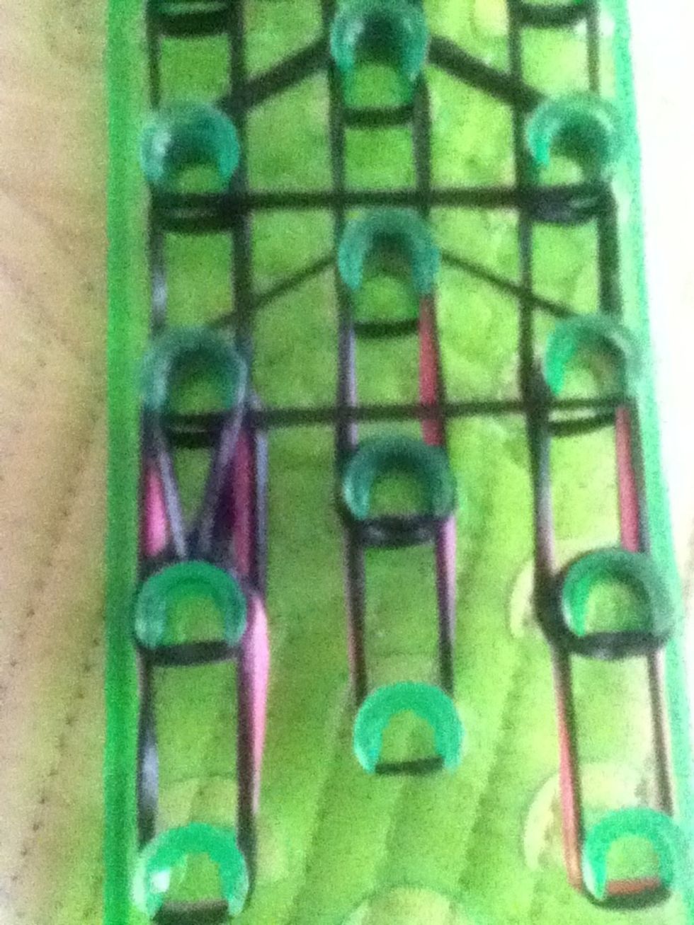 Now start looping until you get to the top repeat with all the pegs grab the bottom 2 and bring the to the top