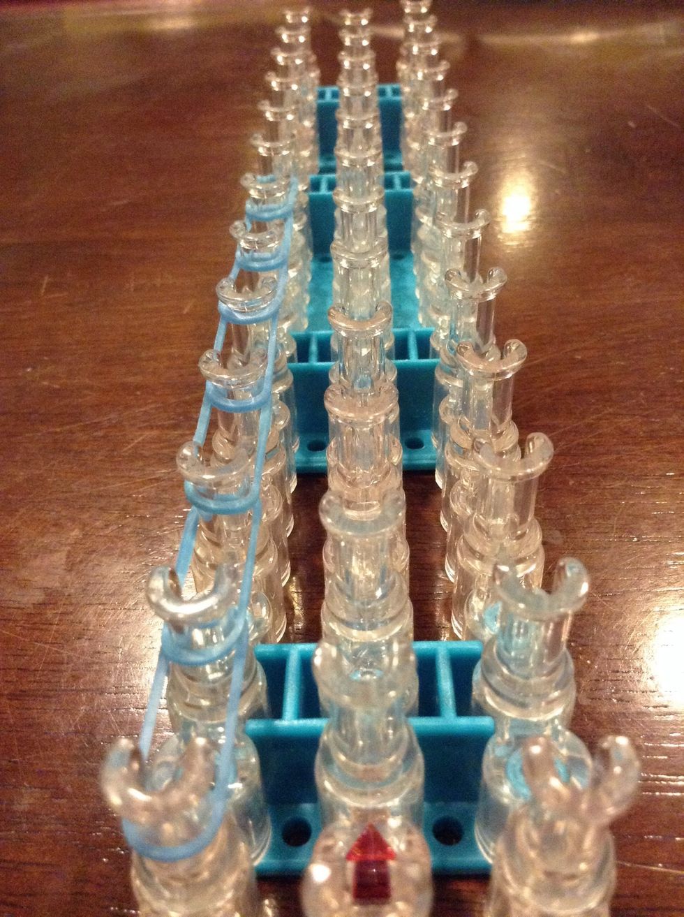 Now start putting rubber bands all the way up for all three columns