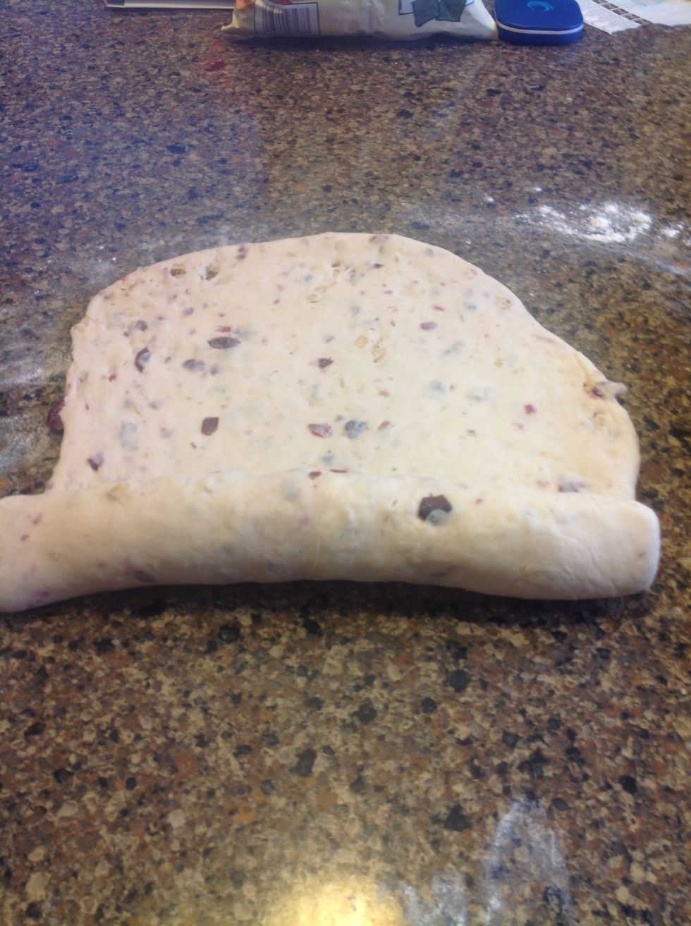 Now start rolling from the short side all the way to the end..... roll,roll,roll your dough....gently to the end. Merrily merrily seal and tuck until you have a tight end!