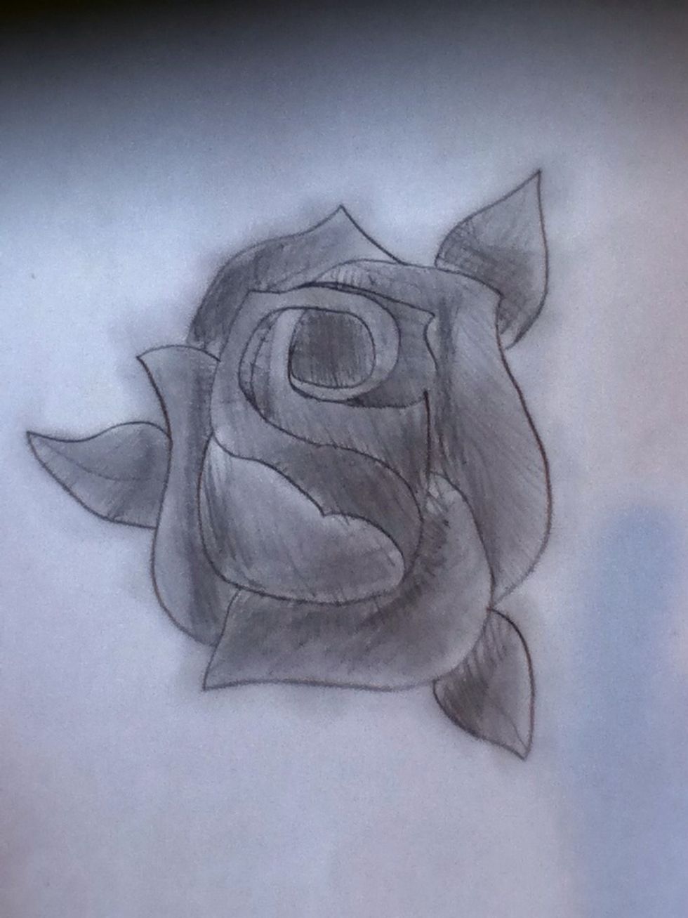 Now, start smearing it. Rub harder on the darker areas and light on the brighter areas. Carful not to mix everything too much, otherwise the rose will look dull.