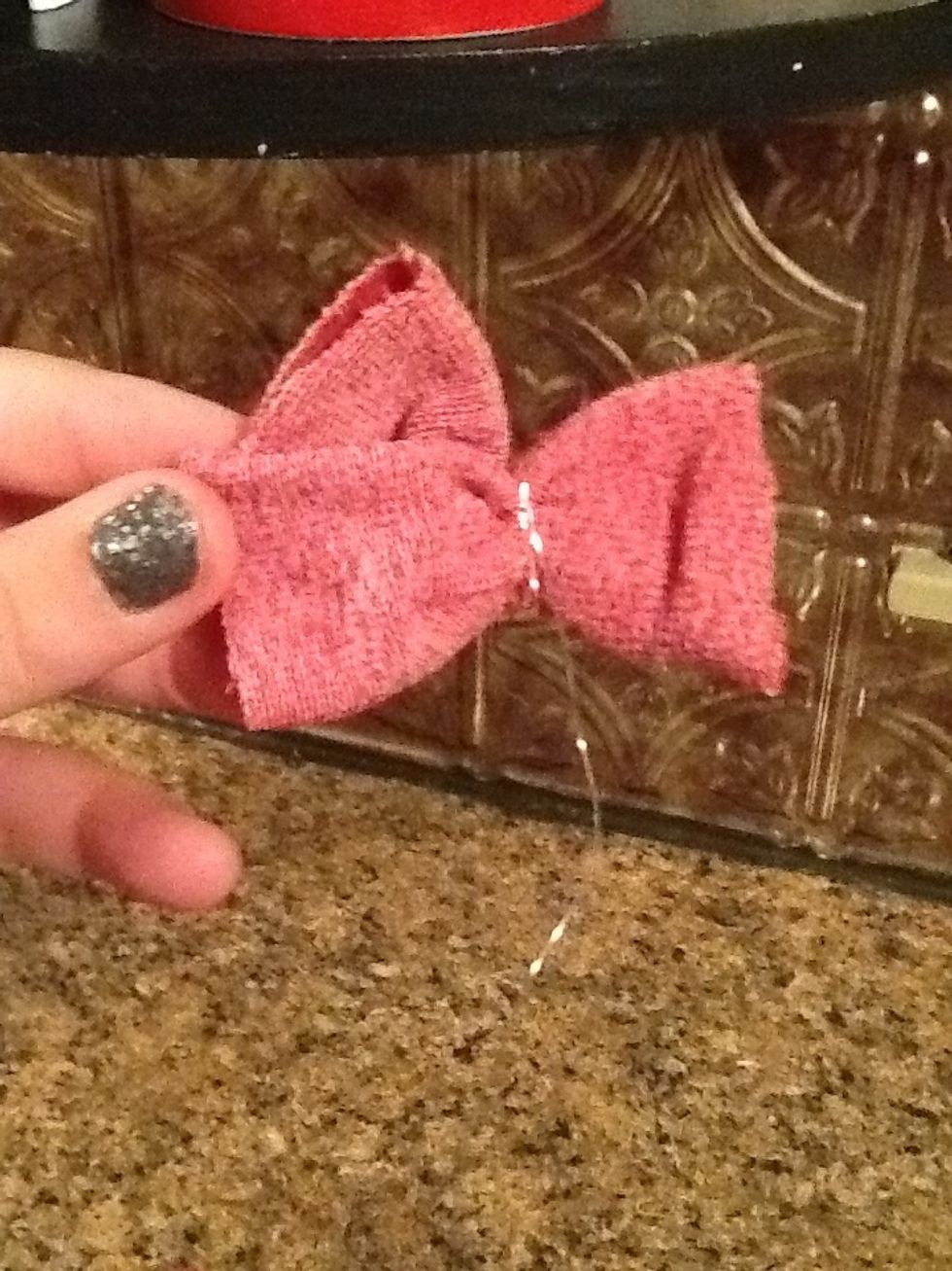 Now start wrapping the twine around the pinched area.....make sure you leave enough twine for later on