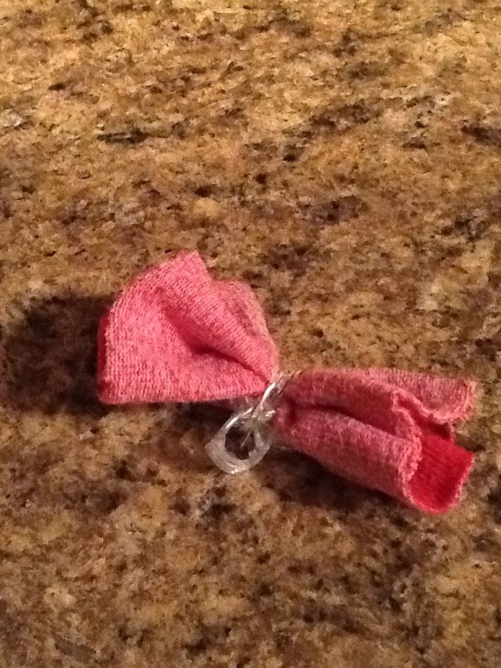 Now start wrapping the twine through and over the clip like in the video following.....