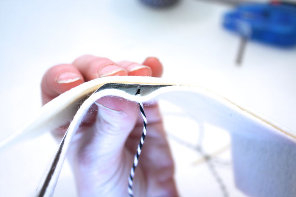 Now start your blanket stitch around the edge. here is a Snapguide on how to sew a blanket stitch! http://snapguide.com/guides/sew-a-blanket-stitch/