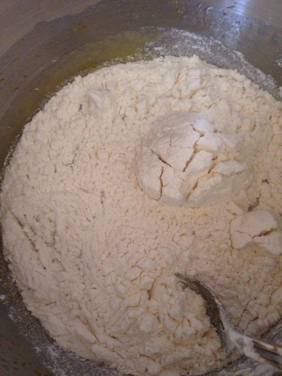 Now step by step add the flour mixture and mixed until soft dough