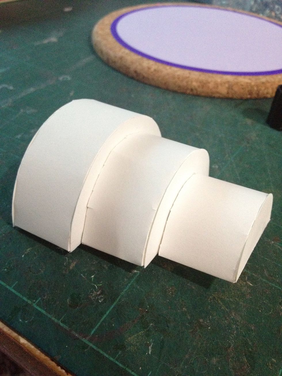 Now stick it all together by putting the biggest at the bottom and the smallest on top. It looks like 3 tier semi round cake, isn't it \ud83d\ude09