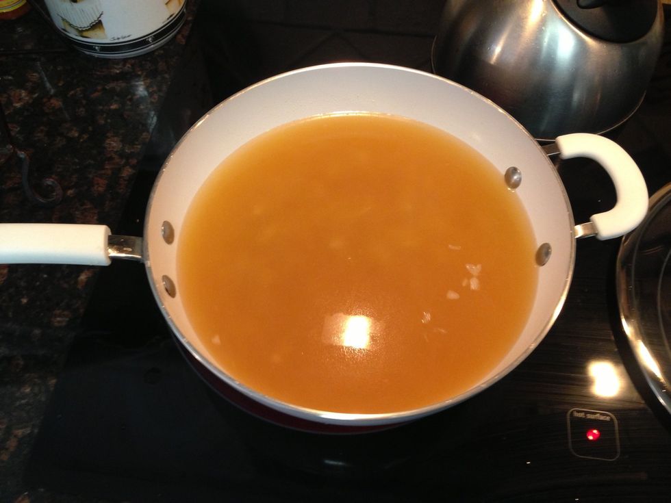 Now stir broth / onion mixture together & bring to simmer.