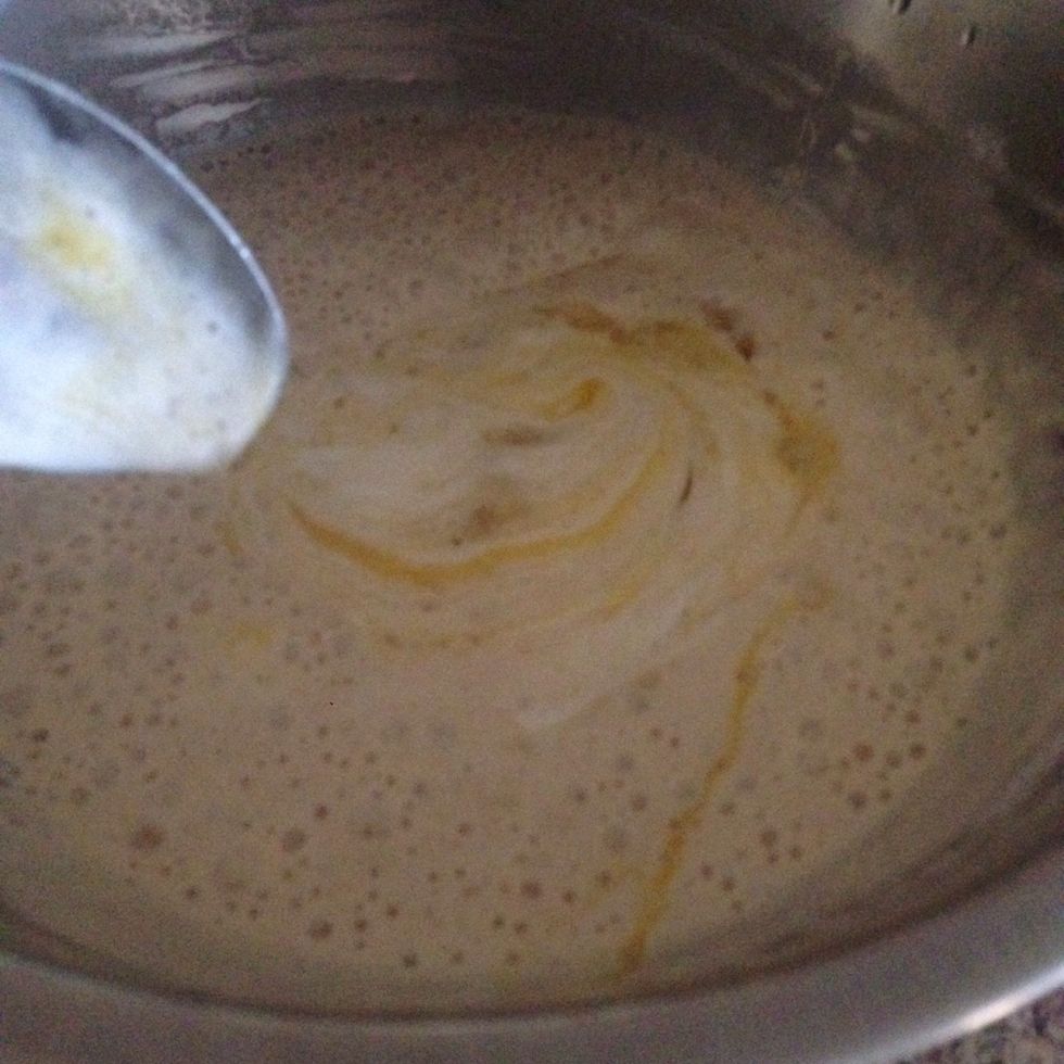 Now stir in salt, olive oil, plain yogurt and egg. Mix thoroughly .