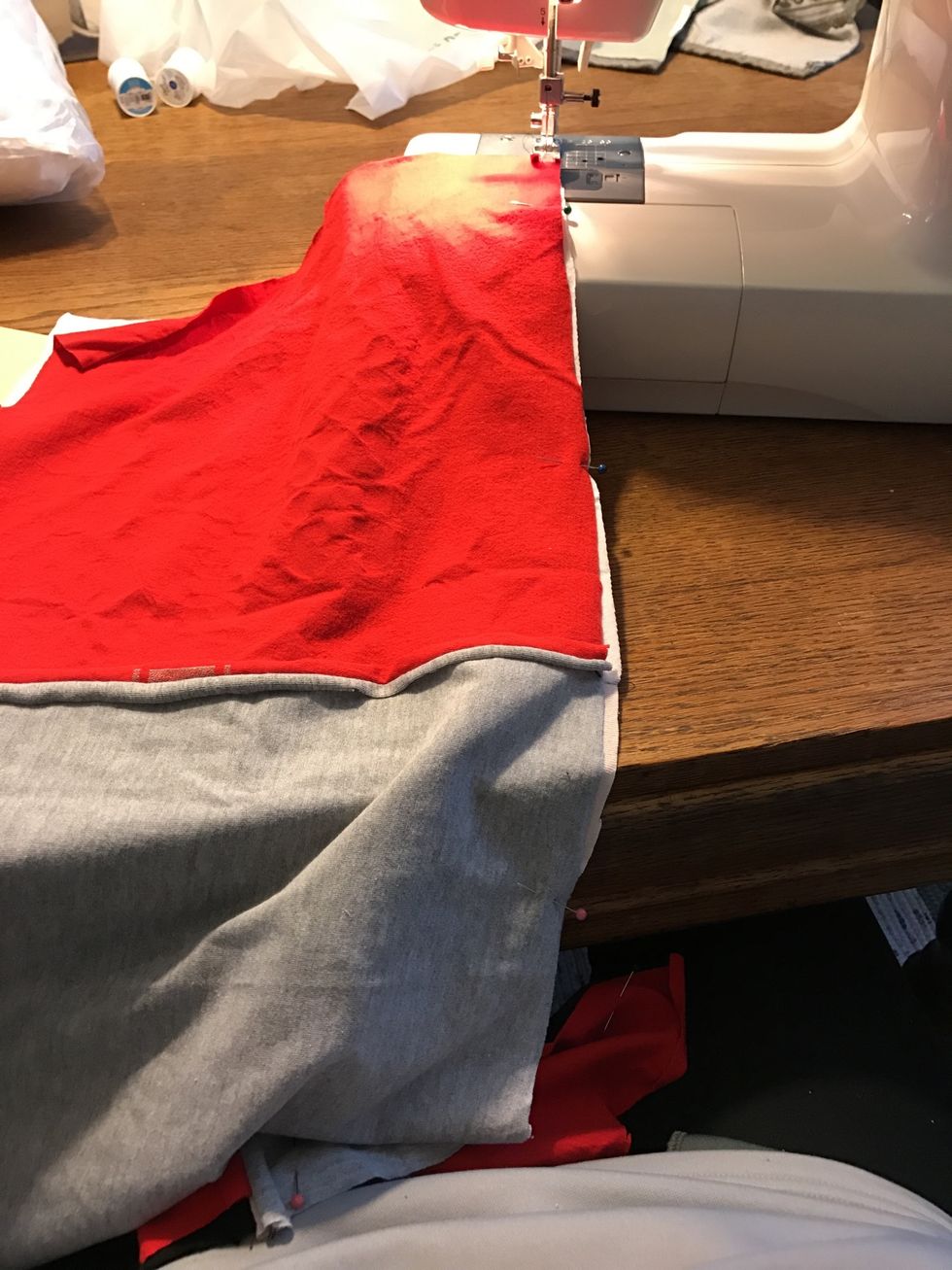 Now stitch the two rows together at 3/8" (line the edge of the shirts up with the right edge of the pressed foot) Don't forget to backstitch at the top and bottom of your seam!