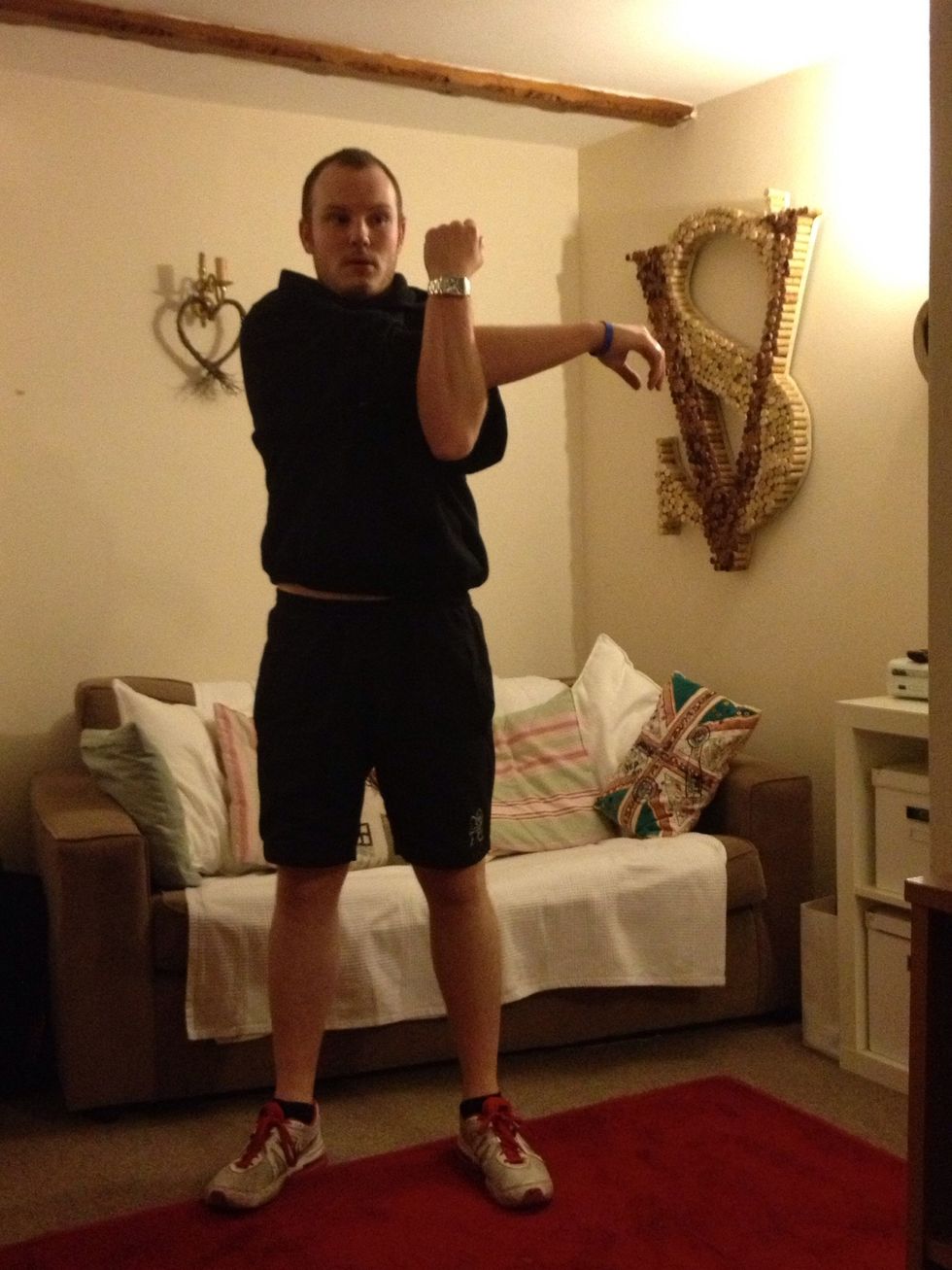 Now stretch your arm across your body an hold with your other arm