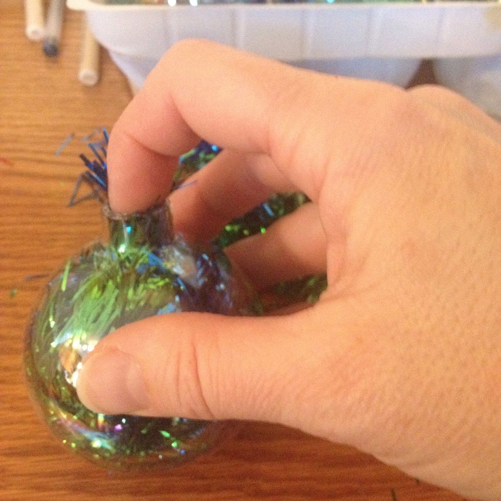 Now stuff the remaining bit into the top.