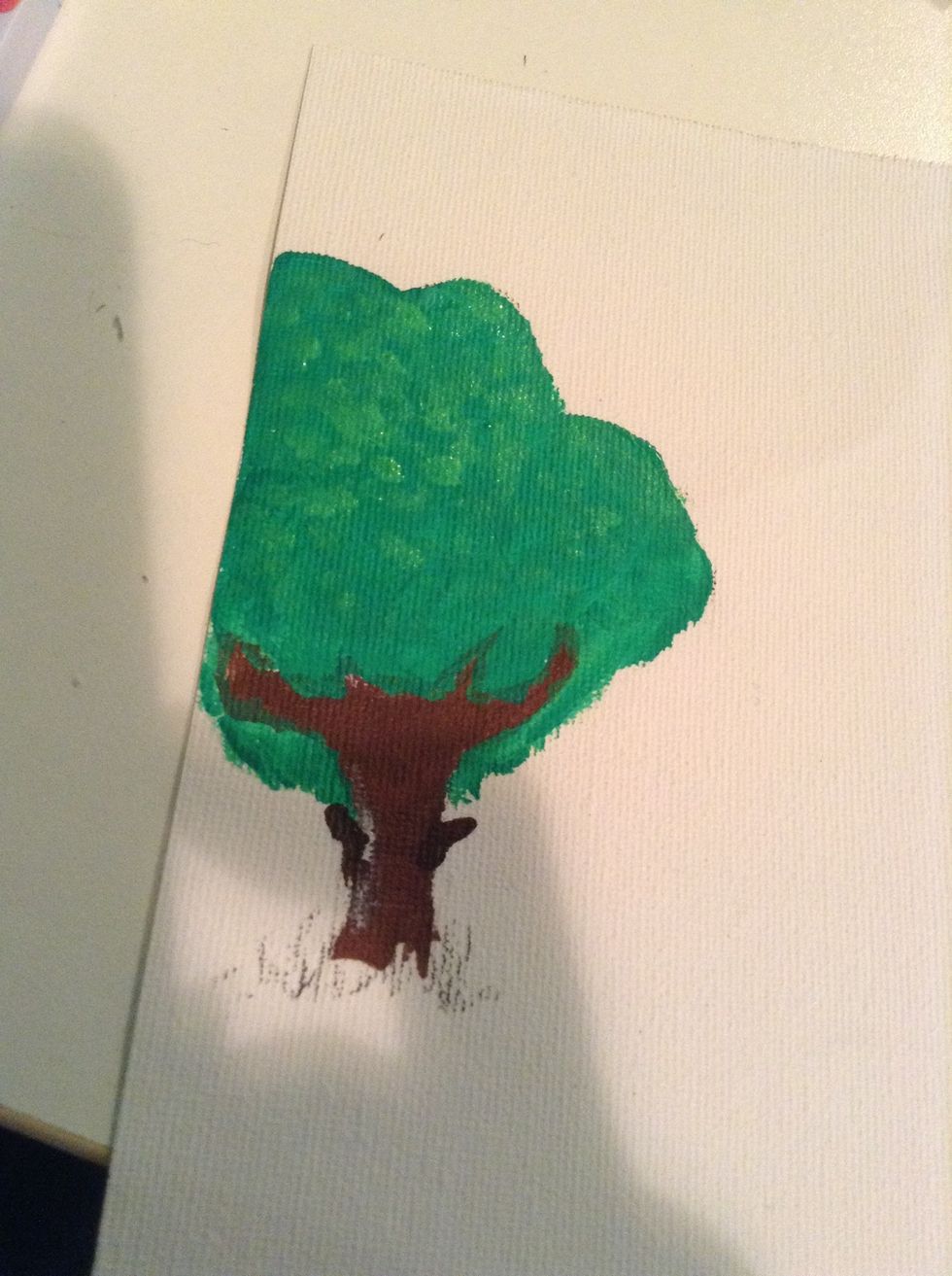 now take a lighter green and make spots at the top fading down