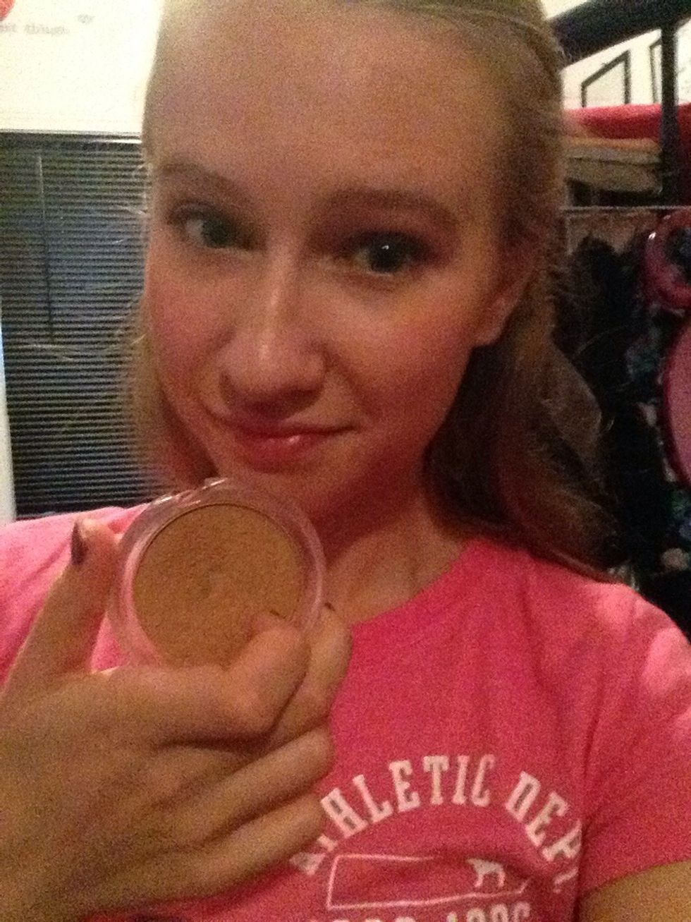 Now take a medium bronzer put some on a brush.