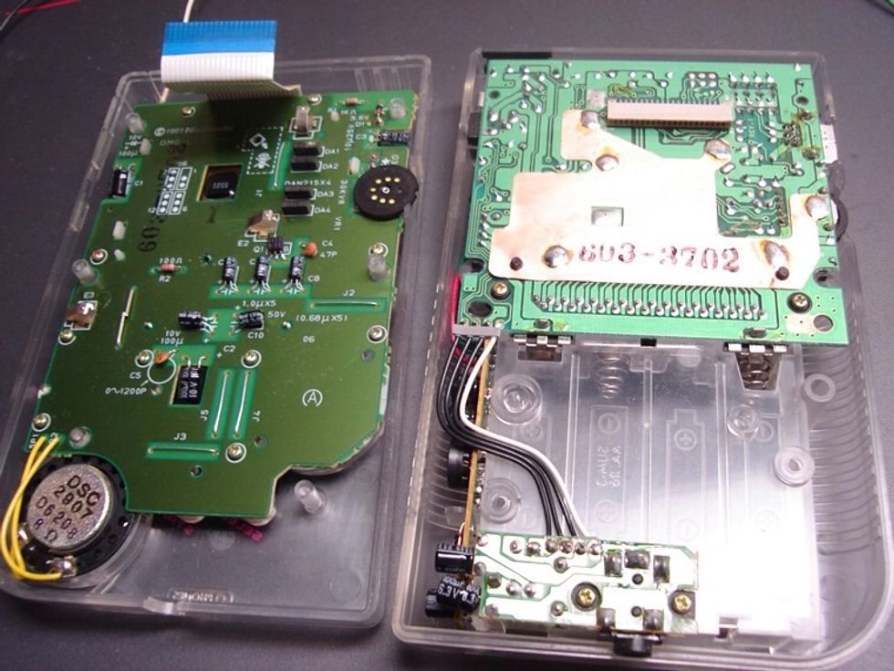 Now take a moment to check out the inside of the gameboy. In the image above you can see the 3 points on the board we're going to be soldering to. Check step 7 for the wiring diagram.