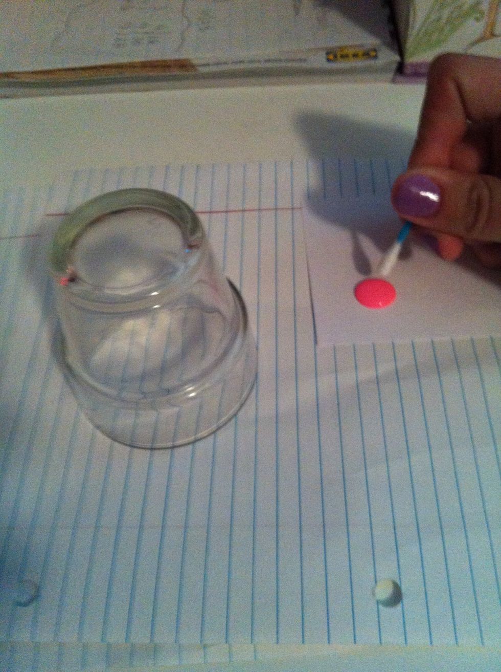 Now take a small amount of the paint and dip a Q tip in the paint to start dotting