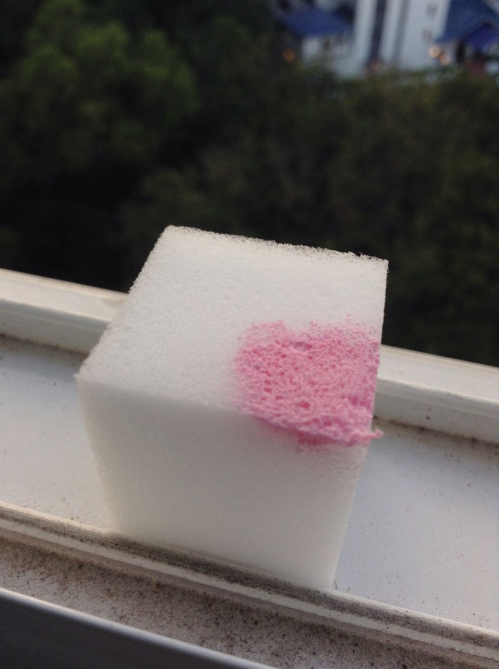 Now take a sponge and paint a corner with baby pink