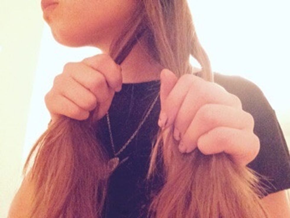 Now take a strand from the other side