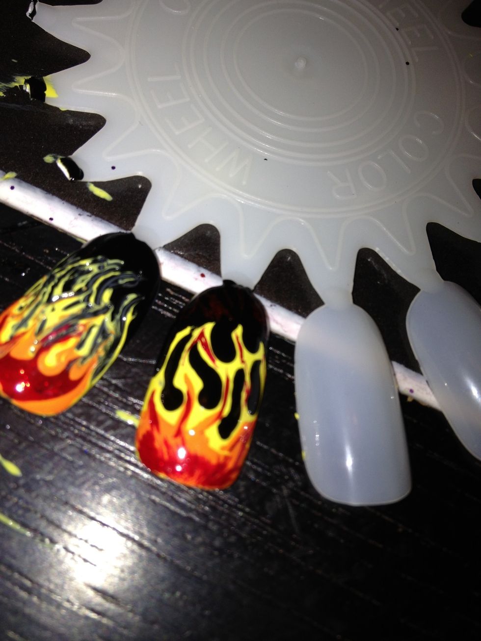 Now take a Striper and add red in the flames :) and your done! Add a glittery topcoat if you wish for a better effect :)