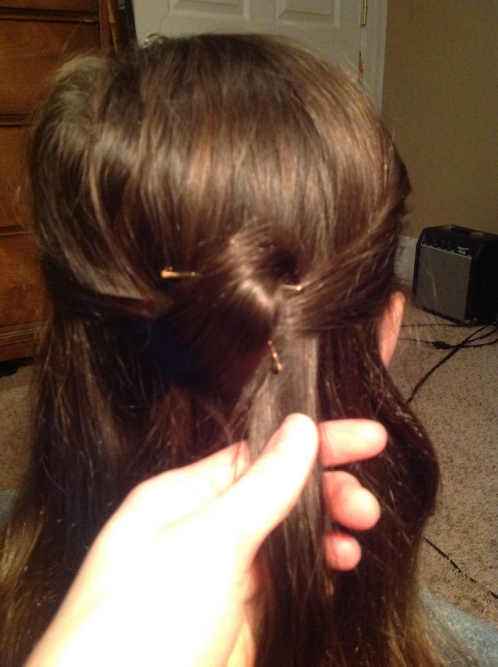 Now, take another piece of hair, but this time, from the 'right' of the hair tie. Note: Do NOT include any hair from the previous piece in this new piece!