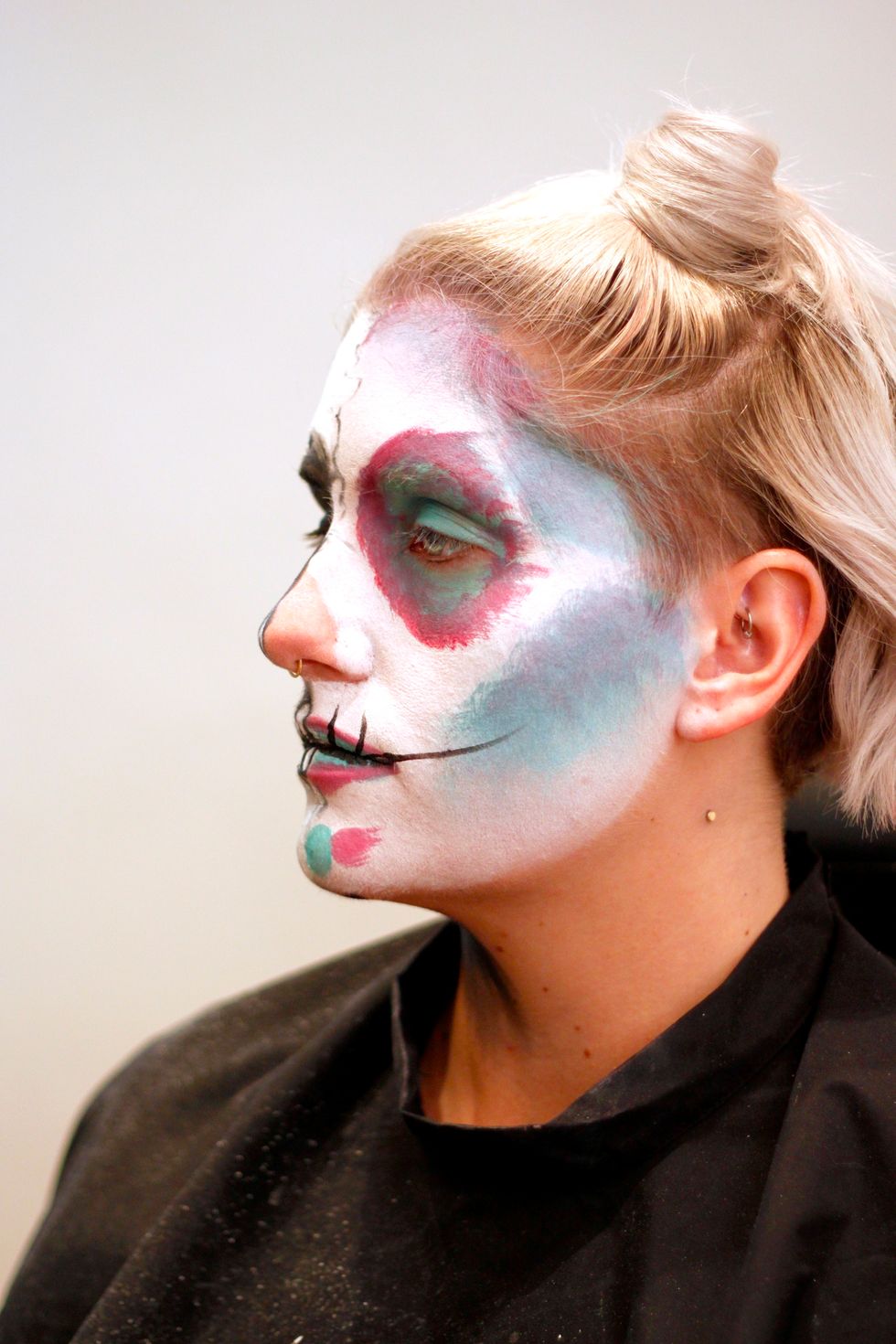 Now take black Aquacolor on a fine-tipped brush and start to draw the teeth.