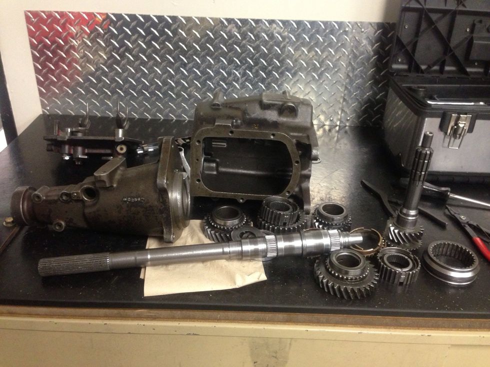 Now take everything off by lightly hitting the shaft on the bench