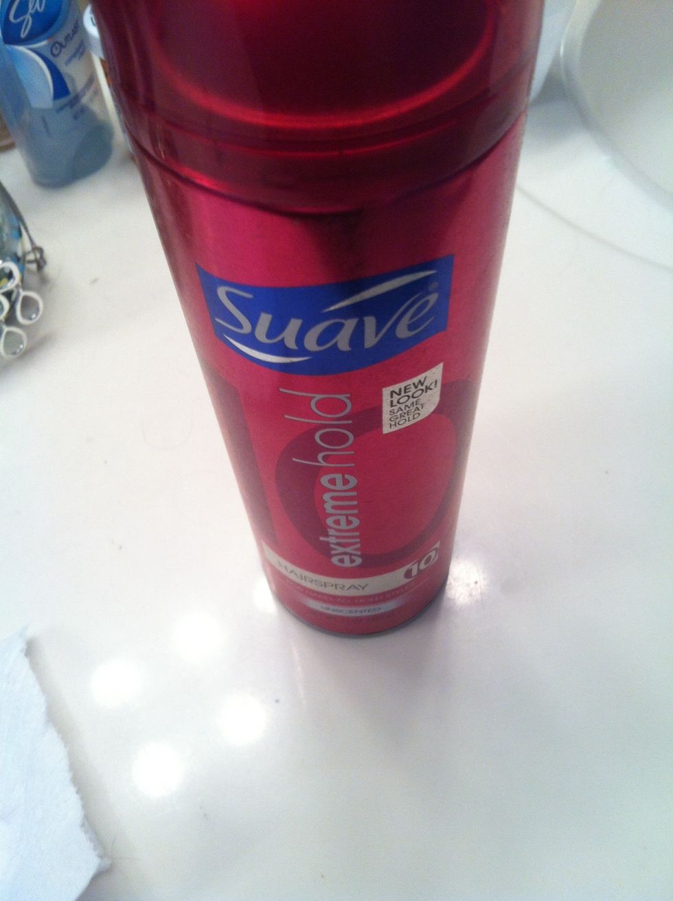 Now take hairspray of your choice I have the suave extreme hold which works wonderful!