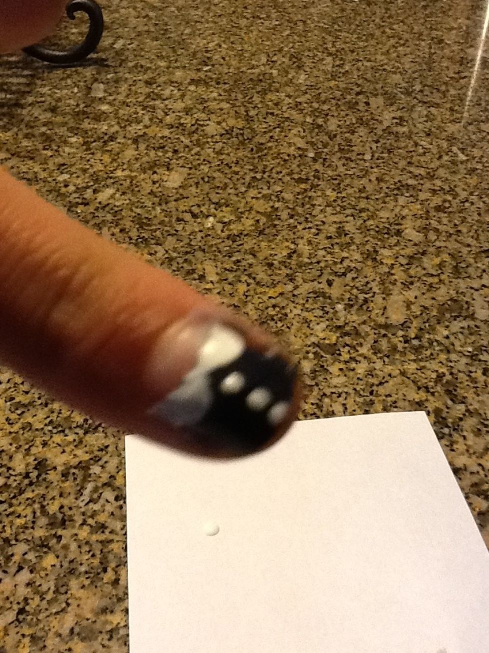 Now take off the reinforcement label of so you have little Peter pan collars on your nails!