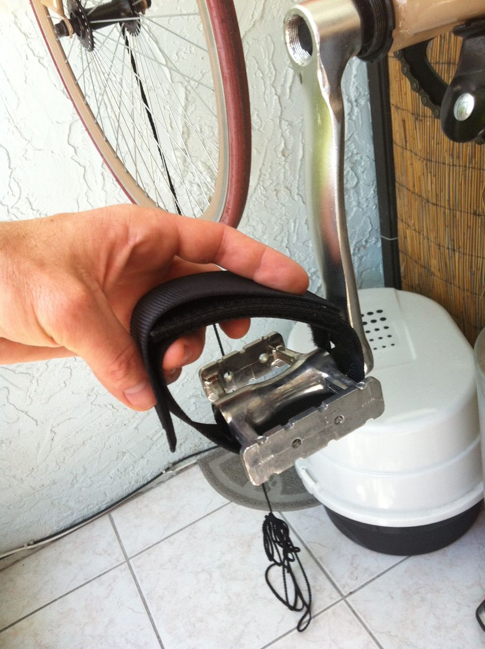 Now take one of your extra pieces, fold it over the top to the outside edge of the pedal, and mark.