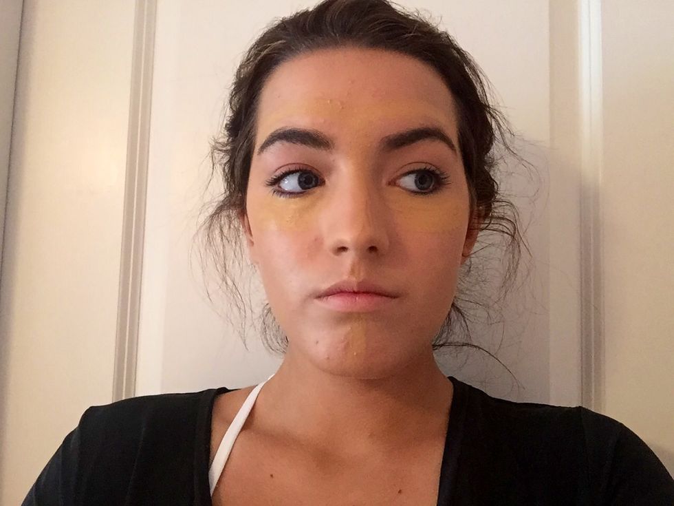 Now take out your contour stick. Open the highlight side, which is the lighter side, and apply on chin, T-Zone (nose and forehead) and under eyes. DO NOT BLEND