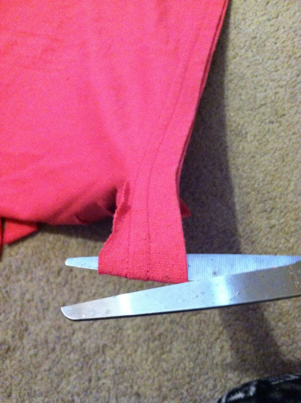 Now take the first slit and cut the still connected side